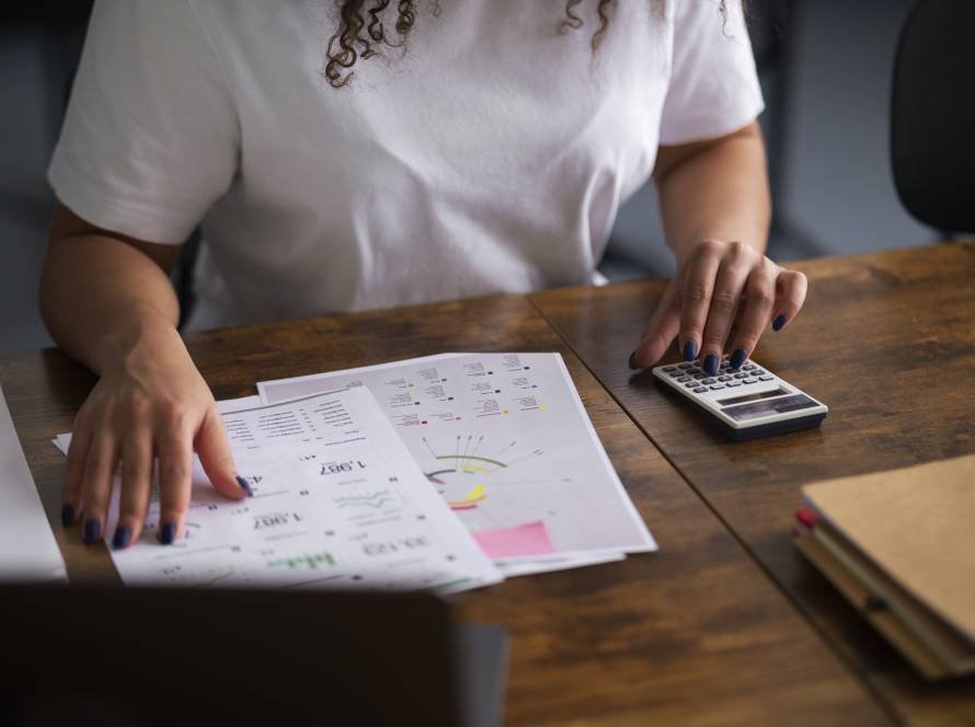 woman working as economist high angle